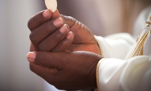 communion-hands-priest-eucharist.jpg